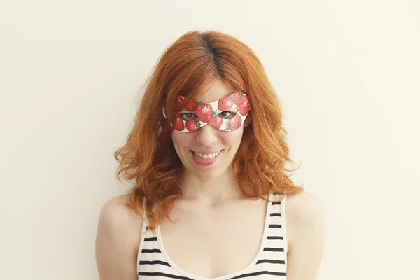 Superhero girl wearing mask with strawberries — Stock Photo, Image