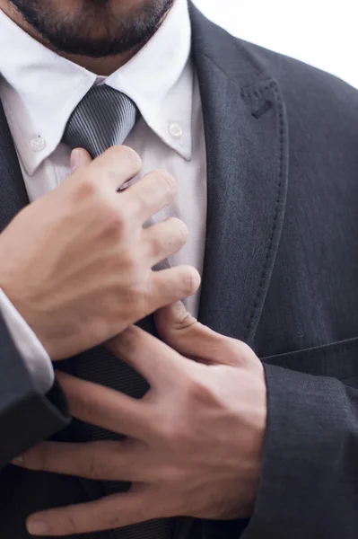 Tying a tie — Stock Photo, Image