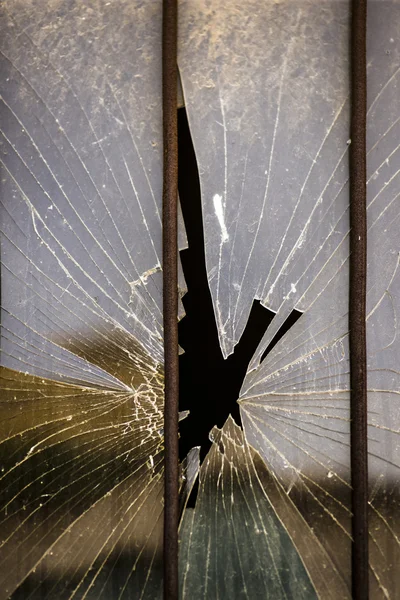 Rozbité okno jako lidské siluety — Stock fotografie