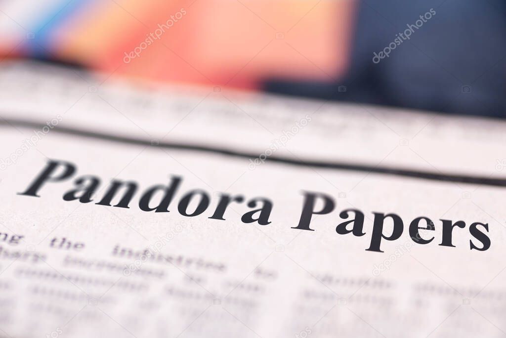 Pandora Papers written newspaper close up shot to the text.