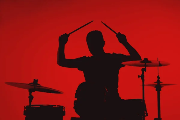 Silhouette Young Man Playing Drums Red Background — Stok fotoğraf