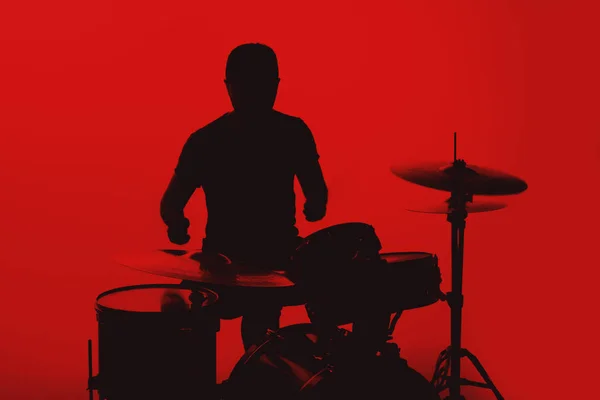 Silhouette Young Man Playing Drums Red Background — 스톡 사진