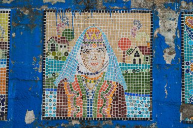 Izmir, Turkey - September 1, 2021: Faience figure decorations on a wall at Nazarkoy Kemalpasa Izmir Turkey