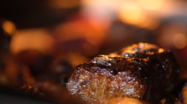 Close up footage of cooking meatballs in the oven.