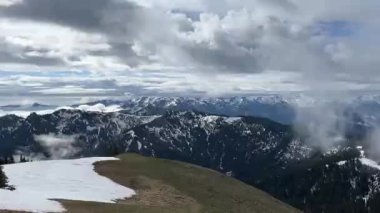 View of the Olympic Mountain Range from the Hurricane Hill Trail in late Spring with some snow and a cloudy sky. Olympic National Park, Port Angeles - Washington