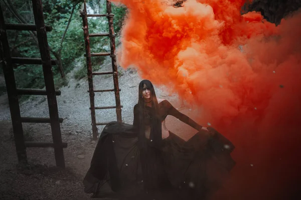 Young Woman Witch Stands Black Dress Dark Foggy Forest Halloween — Stock Photo, Image