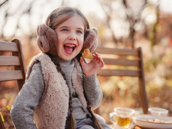 Girl Picnic Sitting Wooden Chair Eating Cookie Child Holding Gingerl — Foto Stock