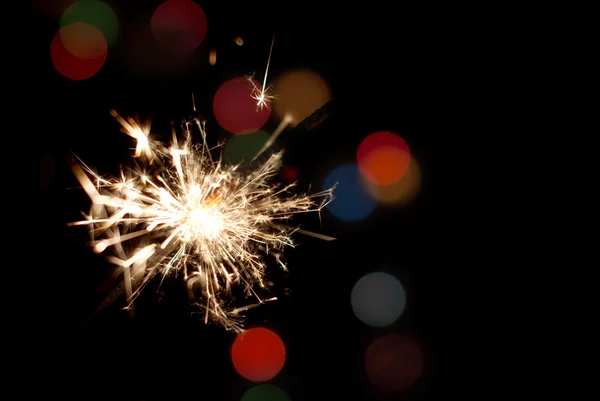 Photo of Christmas lights on the background bokeh from bright lights — Stock Photo, Image