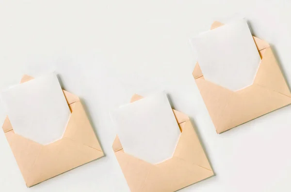 Three Open Orange Envelope White Paper Sheet White Background Empty — Stock Photo, Image