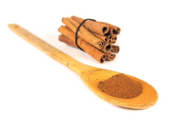 Sticks of cinnamon and milled — Stock Photo, Image