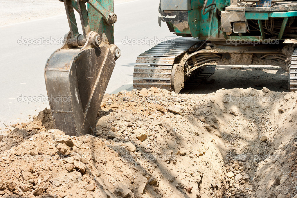 Tractor excavating