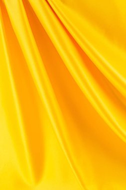 Saten kumaştan örülmüş sarı ipek kumaş, doku, arkaplan