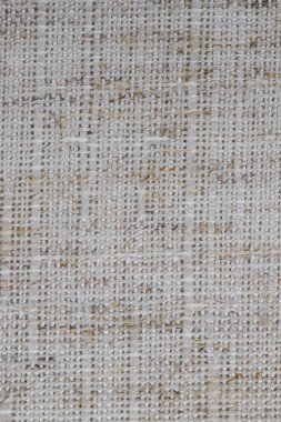 Yün, keten ve tekstil dokusundan yapılmış bir kumaş örneği.