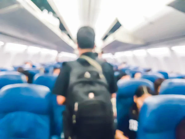 Θολή Φωτογραφία Του Επιβάτη Σακίδιο Πόδια Στο Αεροπλάνο — Φωτογραφία Αρχείου