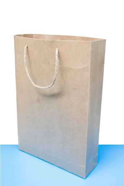 Natural Brown Paper Bag Blue Ground — Stock Photo, Image