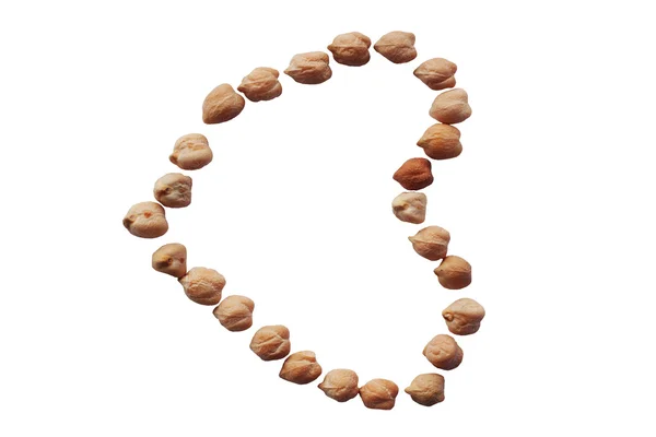 Chickpeas laid out in the form of heart on a white background — Stock Photo, Image