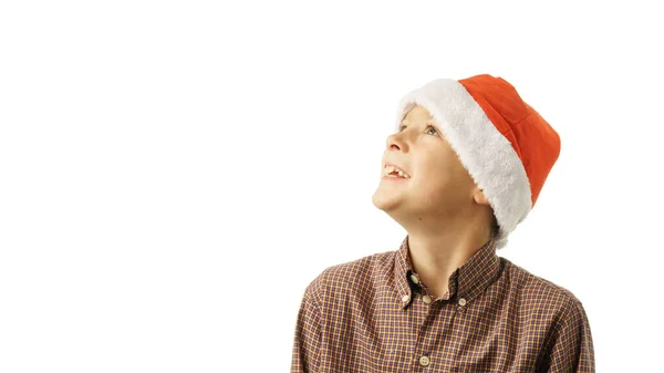 Happy Boy Santa Claus Hat Looks Side Isolated White Background — Stock Photo, Image