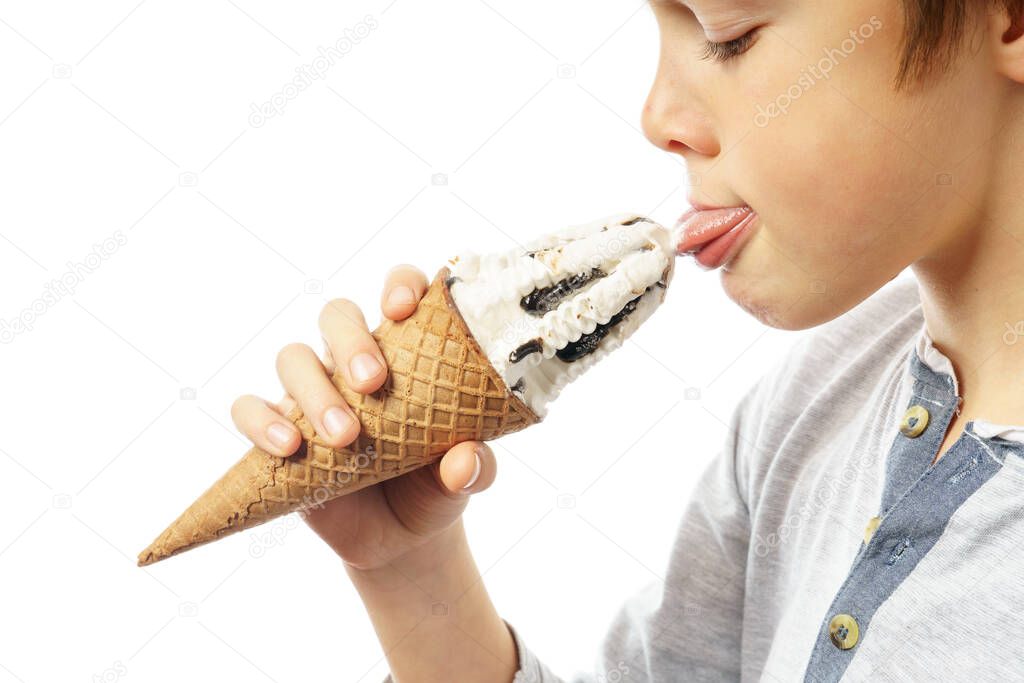 boy licking ice cream isolated on white background