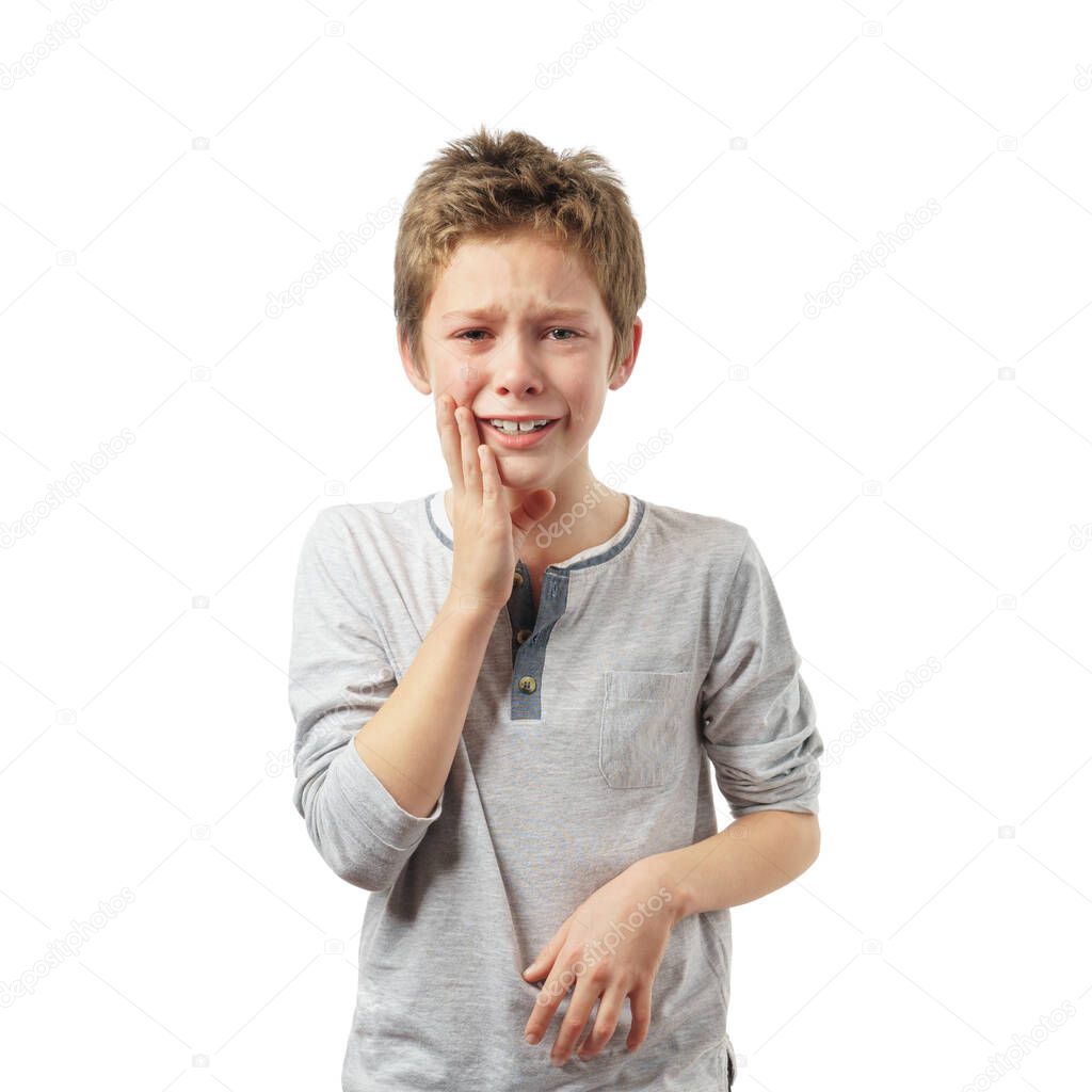 boy crying from toothache isolated on white background.