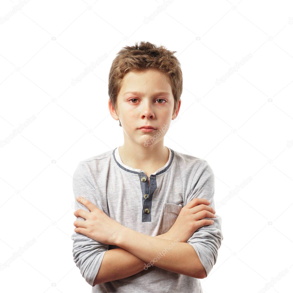crying sad boy, isolated on white background. beautiful caucasian child with red eyes
