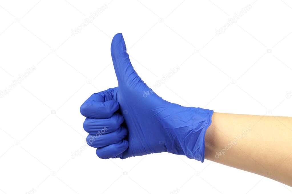 hand in blue medical glove showing thumbs up on white background