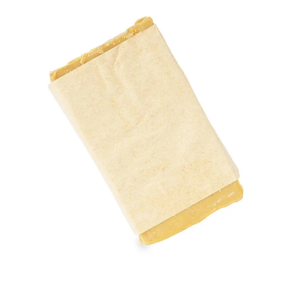 Beyaz Arkaplanda Izole Edilmiş Bir Kahverengi Çamaşır Sabunu — Stok fotoğraf