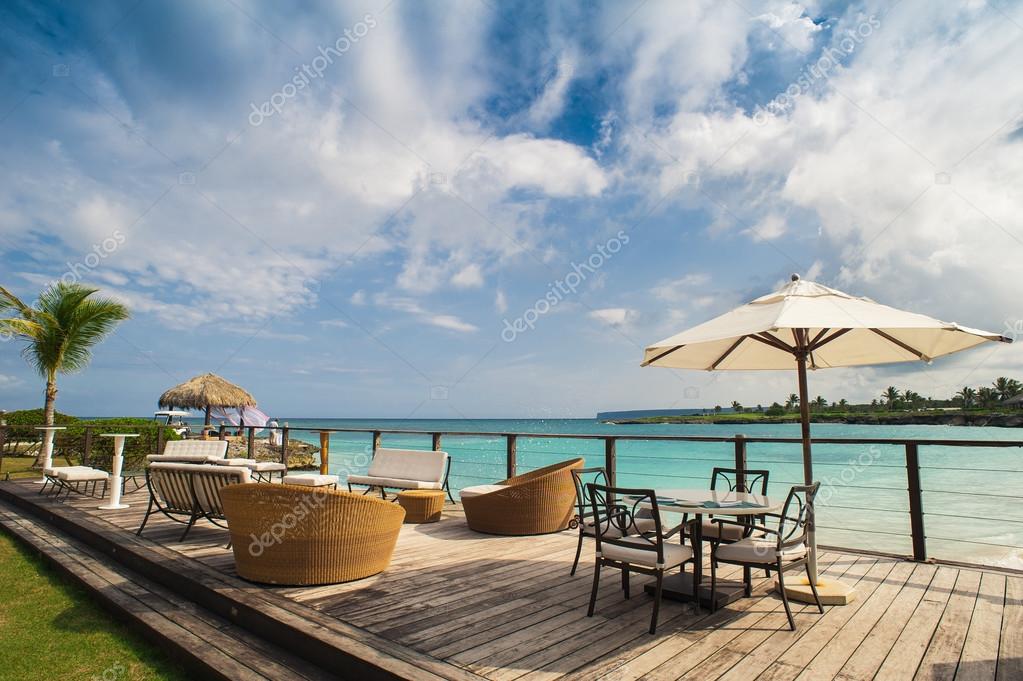 Outdoor restaurant at the beach Stock Photo by ©AZZ 42769123