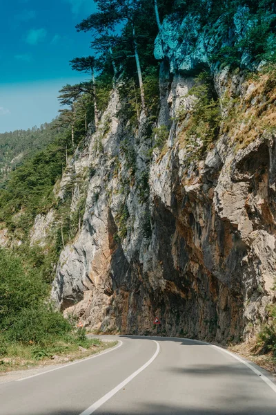 Empty route and small tunnel in mountain — Stock Photo, Image