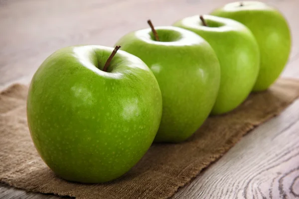 Green Apples on a Burlap — Stock Photo, Image