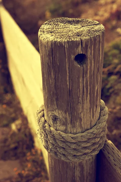 Wooden fence at ranch with ropes — Stock Photo, Image
