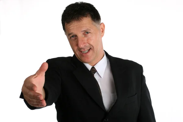 Businessman with intention to shake hand — Stock Photo, Image