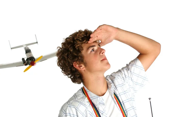 Menino com avião de plástico — Fotografia de Stock