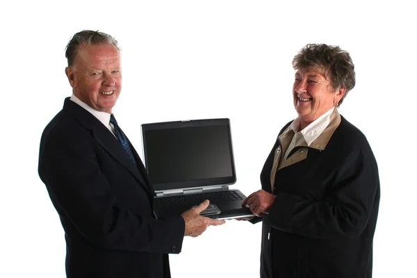 Empresário com assistente usando computador — Fotografia de Stock