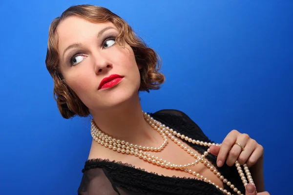 Woman with pearl necklace Stock Image