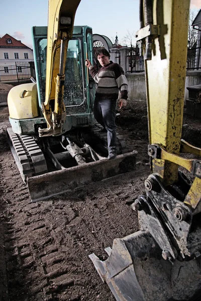 Man with dredger — Stock Photo, Image