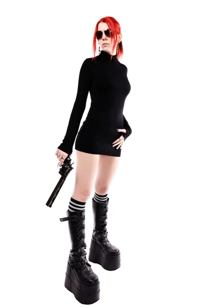 Σέξι γυναίκα με ένα πυροβόλο όπλο — Stok fotoğraf