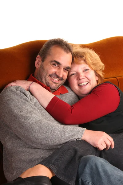 Couple on sofa — Stock Photo, Image