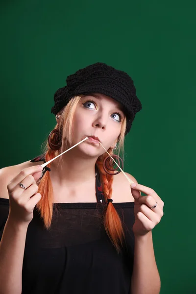 Girl playing with a chewing gum — Stock Photo, Image