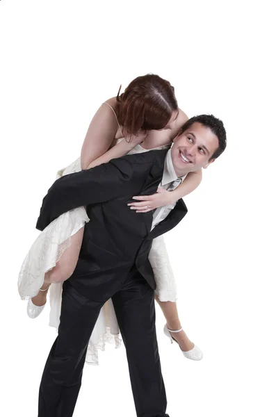 Groom giving piggyback ride — Stock Photo, Image