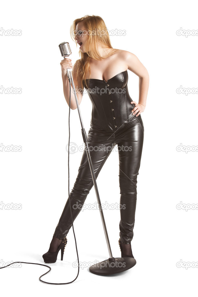 Woman singing in microphone