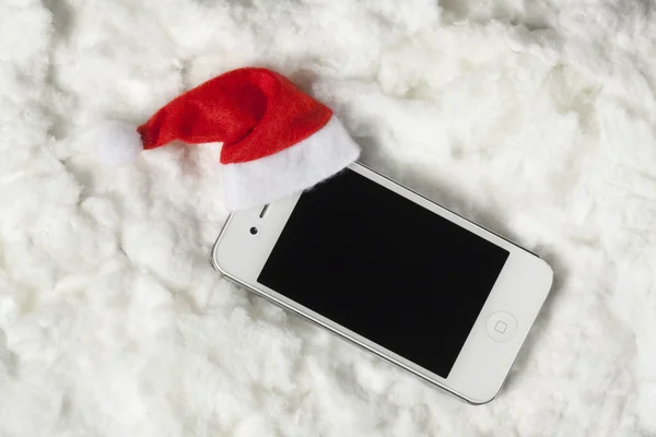 Cellulare con cappello da Babbo Natale — Foto Stock