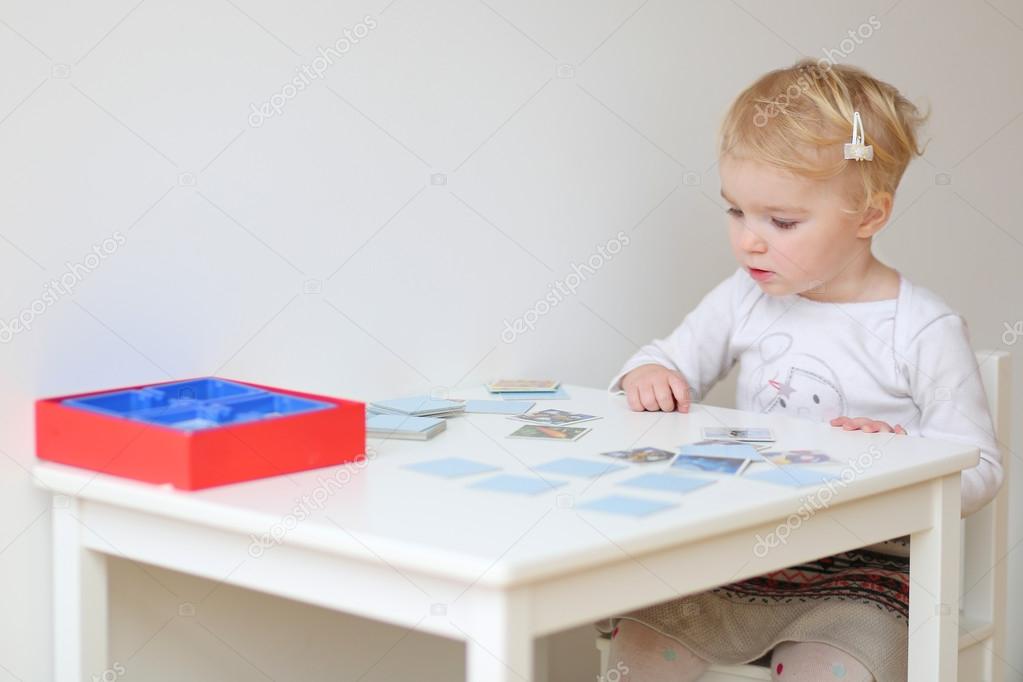 Girl playing memory game