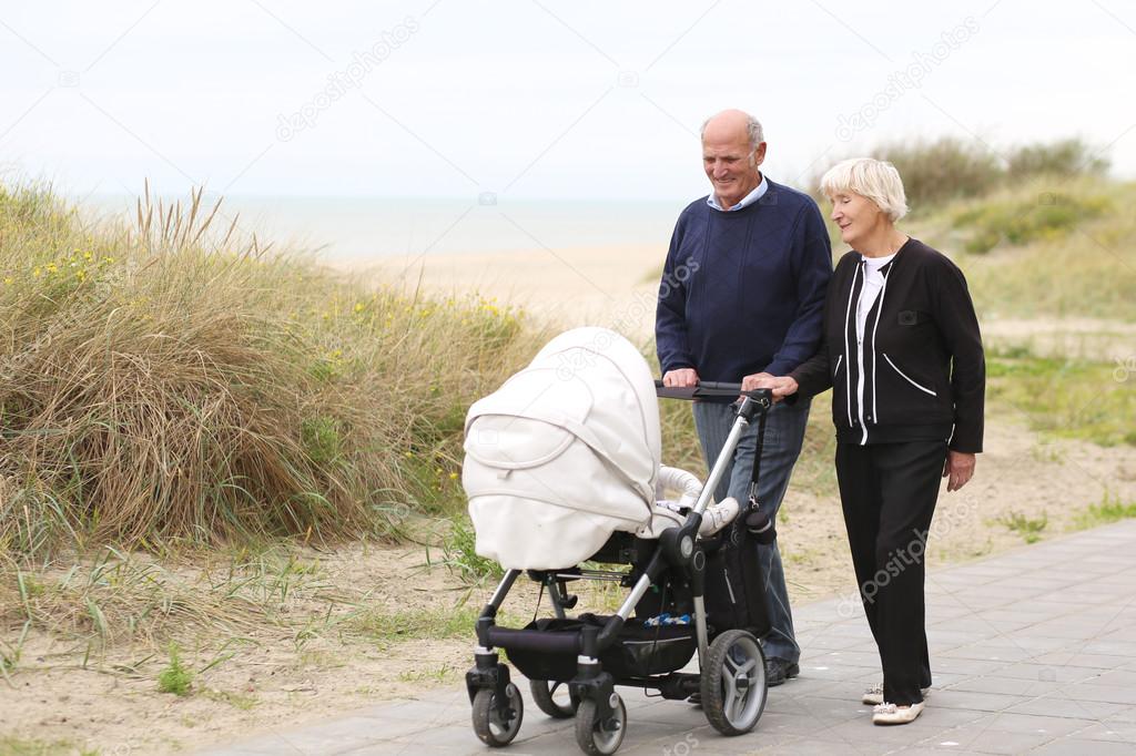 Couple with baby on a beach