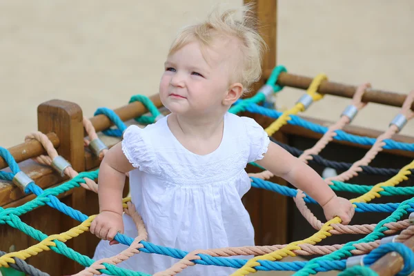 Baby girl playing at playground — Stock Photo, Image
