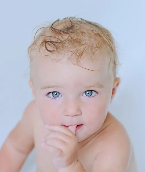 Cute baby sucking her thumb — Stock Photo, Image