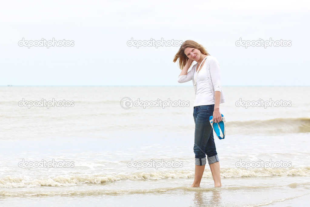 Woman having fun on the beach