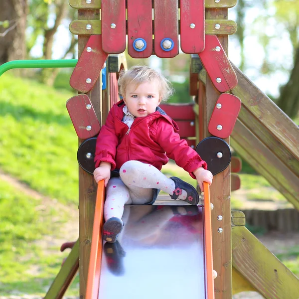 Girl having fun in playground — Stock Photo, Image