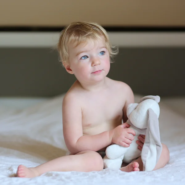 Girl playing with teddy bear — Stock Photo, Image