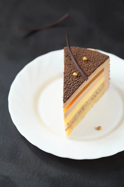 Piece of Multi-layered Velvet Mousse Cake — Stockfoto