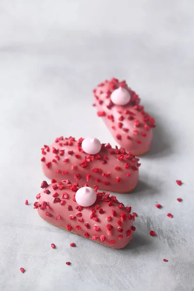 Pink Eclair Raspberry Cream Filling Covered Pink Chocolate Sprinkled Freeze 스톡 사진